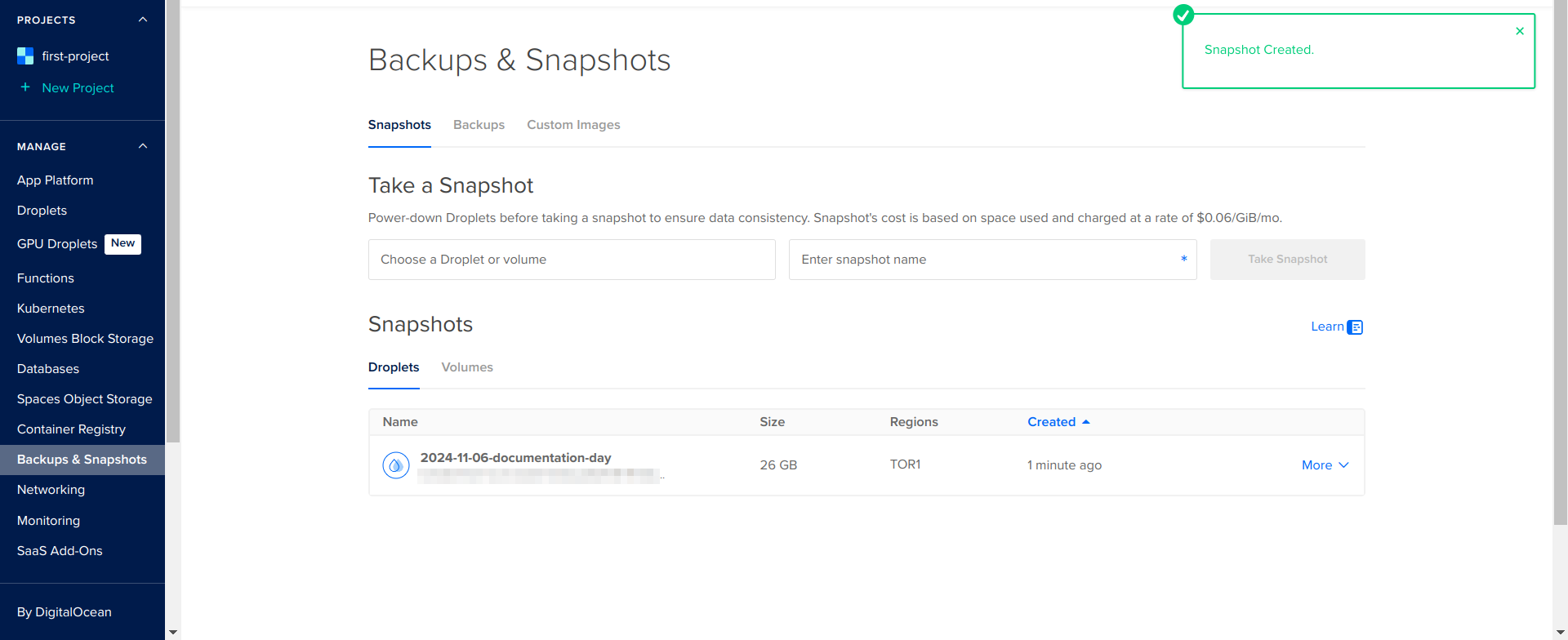 Capture of DigitalOcean, Manage, Backups & Snapshots, Snapshots page. Notification of "Restoring" on right side of page highlighted in purple.